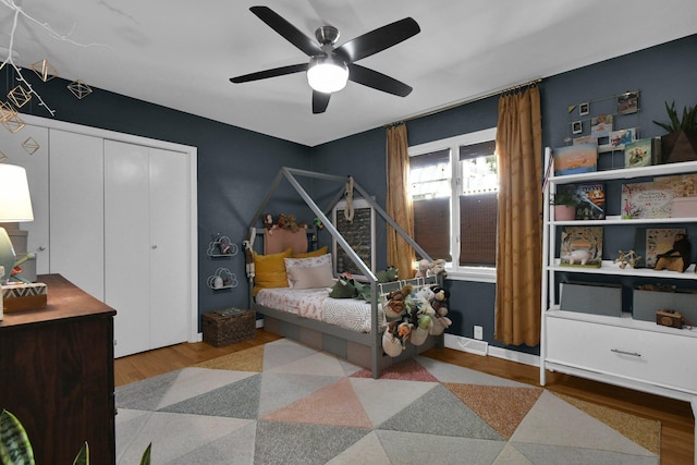 160 Wildwood Dr, Granville, OH 43023 - bedroom featuring wood finished floors, a ceiling fan, and a closet