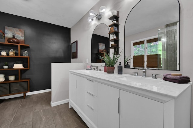 160 Wildwood Dr, Granville, OH 43023 - bathroom with double vanity and baseboards