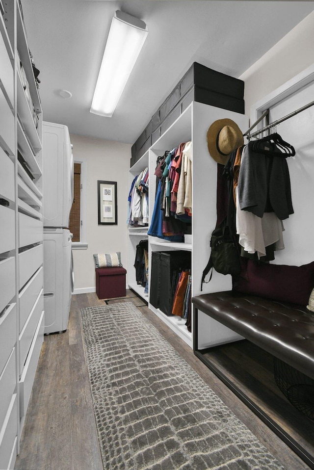 160 Wildwood Dr, Granville, OH 43023 - walk in closet featuring stacked washing machine and dryer and wood finished floors