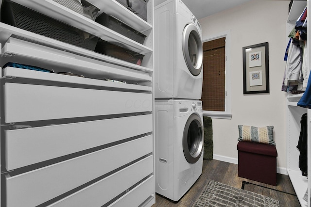 160 Wildwood Dr, Granville, OH 43023 - laundry room featuring stacked washing machine and dryer and dark wood-style floors