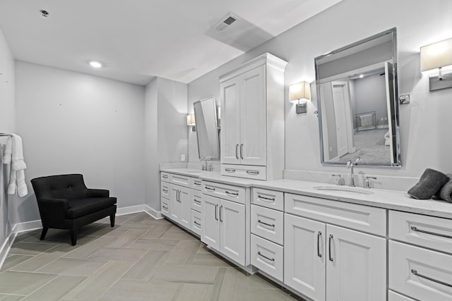 105 N Riverview St Unit 218, Dublin, OH 43017 - bathroom featuring double vanity and recessed lighting