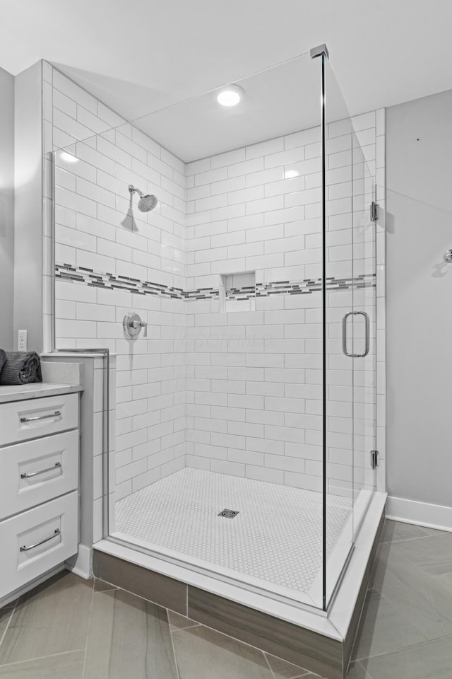 105 N Riverview St Unit 218, Dublin, OH 43017 - full bathroom featuring a stall shower, vanity, and recessed lighting