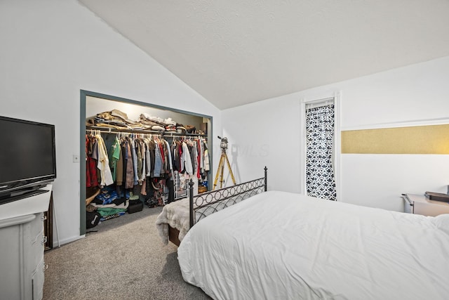 1208 Ashland Ave, Columbus, OH 43212 - bedroom featuring a closet, carpet flooring, and vaulted ceiling