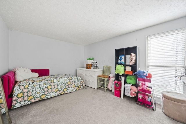 1208 Ashland Ave, Columbus, OH 43212 - carpeted bedroom with a textured ceiling