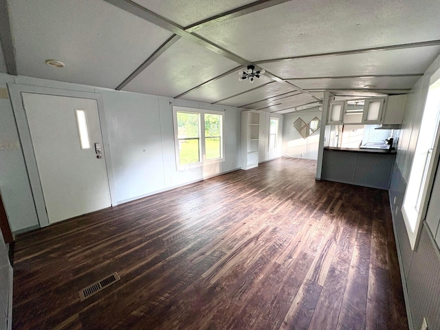 18 Skyline Dr, South Bloomfield, OH 43103 - unfurnished living room featuring dark wood-type flooring