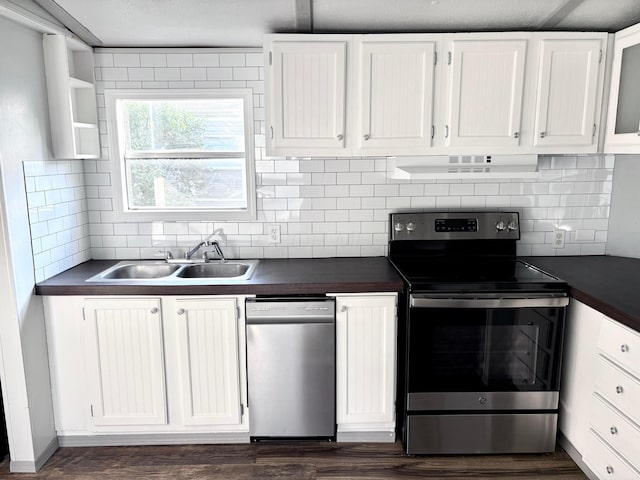 18 Skyline Dr, South Bloomfield, OH 43103 - kitchen with stainless steel appliances, dark countertops, under cabinet range hood, and white cabinets