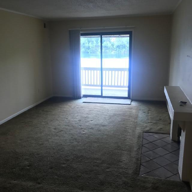 1395 Lake Shore Dr Unit 122, Columbus, OH 43204 - carpeted spare room featuring baseboards