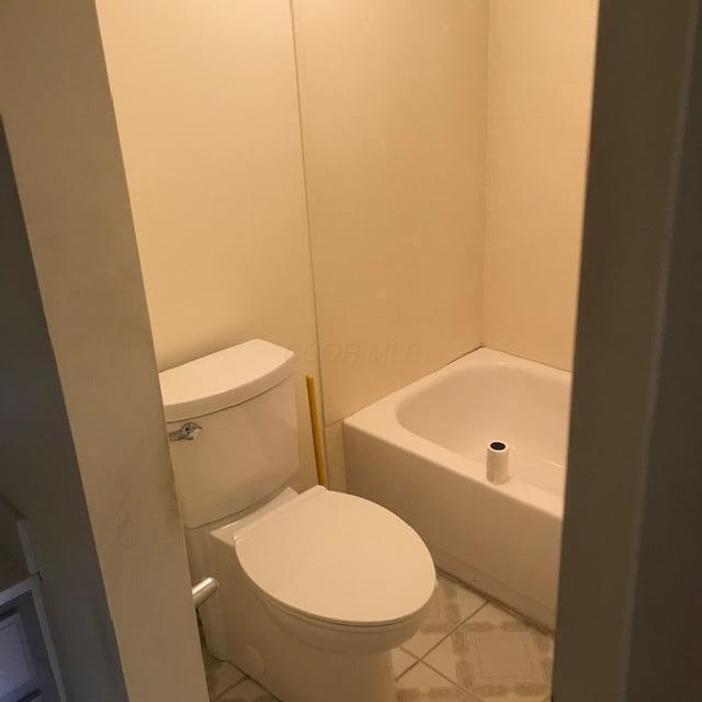 1395 Lake Shore Dr Unit 122, Columbus, OH 43204 - full bathroom with a tub and tile patterned flooring