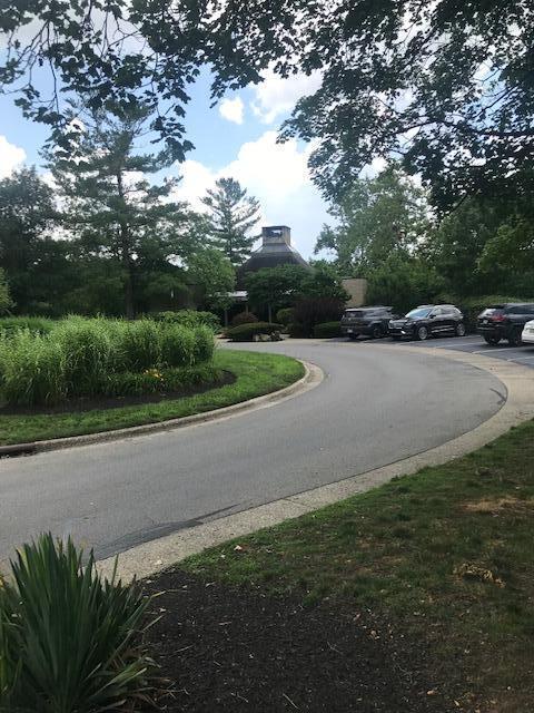 1395 Lake Shore Dr Unit 122, Columbus, OH 43204 - view of asphalt road with curbs