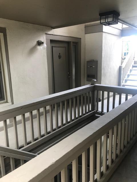 1395 Lake Shore Dr Unit 122, Columbus, OH 43204 - property entrance featuring stucco siding and a balcony