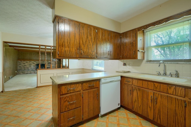 8899 Chevington Ct, Pickerington, OH 43147 - kitchen with dishwasher, healthy amount of natural light, light flooring, and a textured ceiling