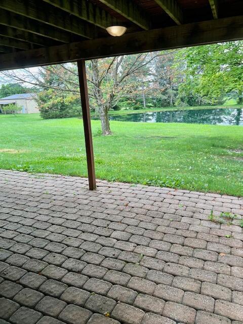 171 Ginder Rd NE, Lancaster, OH 43130 - view of patio featuring a water view
