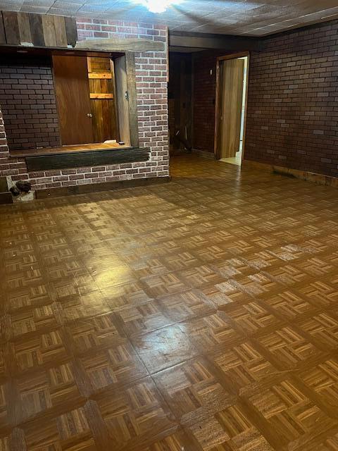 171 Ginder Rd NE, Lancaster, OH 43130 - finished below grade area featuring brick wall