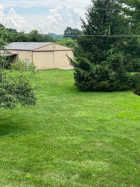 171 Ginder Rd NE, Lancaster, OH 43130 - view of yard featuring an outbuilding