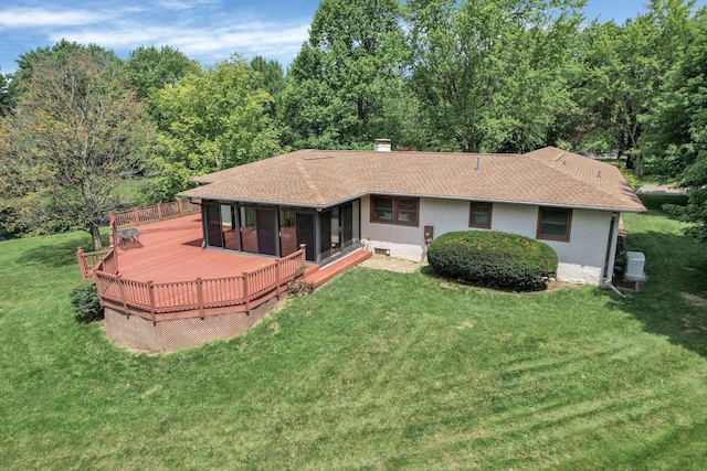 171 Ginder Rd NE, Lancaster, OH 43130 - back of property with a wooden deck, a yard, a chimney, and roof with shingles