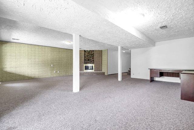 171 Ginder Rd NE, Lancaster, OH 43130 - finished below grade area with a textured ceiling, carpet flooring, and wallpapered walls