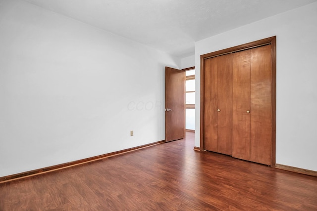 171 Ginder Rd NE, Lancaster, OH 43130 - unfurnished bedroom with wood finished floors and a closet