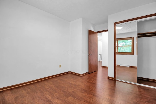 171 Ginder Rd NE, Lancaster, OH 43130 - unfurnished bedroom featuring wood finished floors and a closet