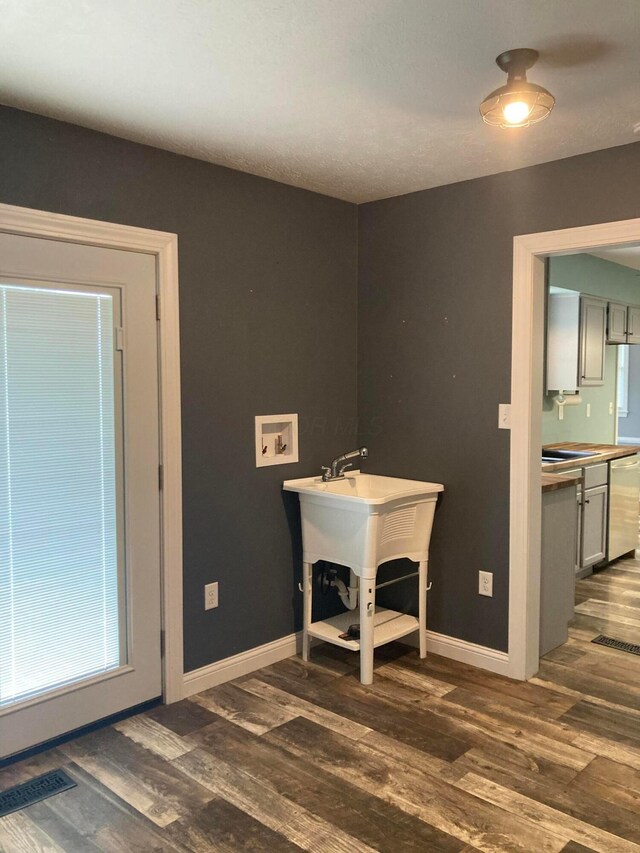 4173 Navajo Trl, Jamestown, OH 45335 - spare room featuring dark wood-type flooring and baseboards