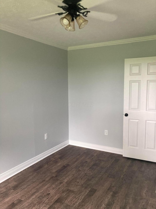 4173 Navajo Trl, Jamestown, OH 45335 - unfurnished room featuring a ceiling fan, dark wood-type flooring, and crown molding