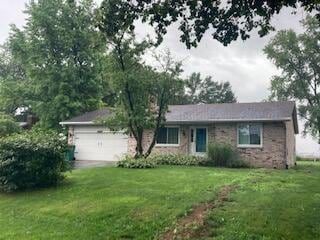 4173 Navajo Trl, Jamestown, OH 45335 - single story home featuring a front yard and an attached garage