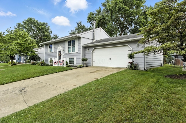2190 Lendale Dr, Lancaster, OH 43130 - view of front of home with a garage, concrete driveway, and a front lawn