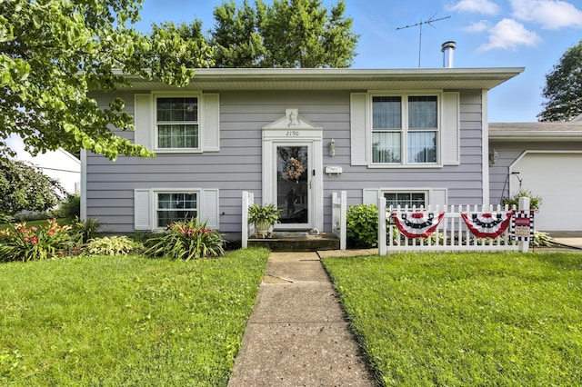 2190 Lendale Dr, Lancaster, OH 43130 - split foyer home with a front lawn and an attached garage