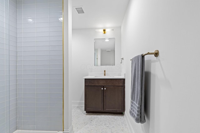 50 W Broad St Unit 3401, Columbus, OH 43215 - full bathroom featuring vanity and a tile shower