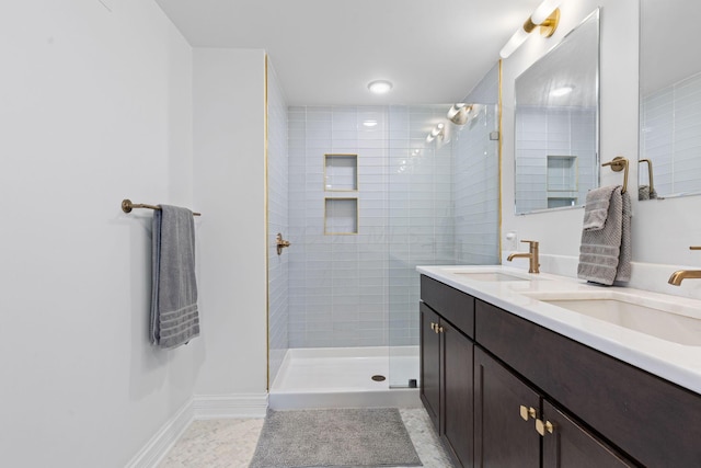 50 W Broad St Unit 3401, Columbus, OH 43215 - bathroom featuring double vanity, walk in shower, and tile patterned flooring