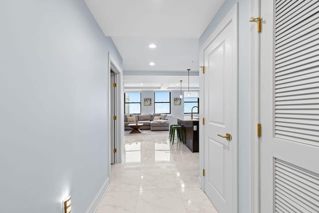 50 W Broad St Unit 3401, Columbus, OH 43215 - corridor with light marble finish flooring and recessed lighting