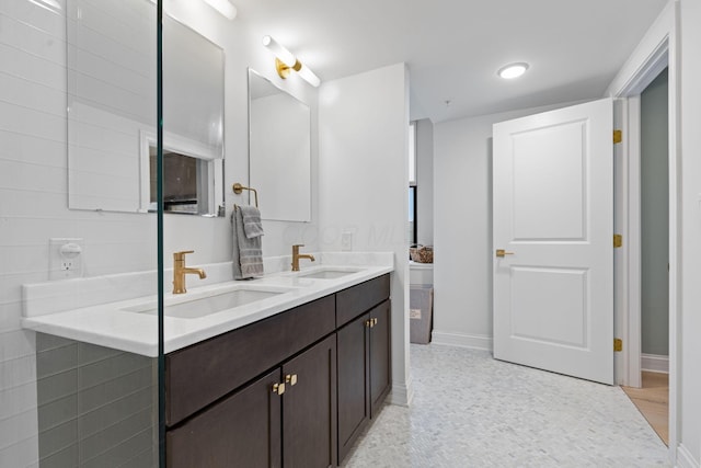 50 W Broad St Unit 3401, Columbus, OH 43215 - full bath with double vanity and baseboards