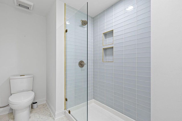 50 W Broad St Unit 3401, Columbus, OH 43215 - bathroom with tiled shower and tile patterned flooring