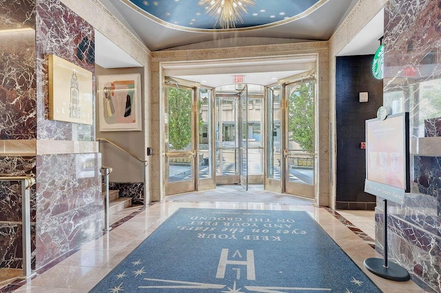 50 W Broad St Unit 3401, Columbus, OH 43215 - foyer with marble tiled floors, healthy amount of natural light, and stairs