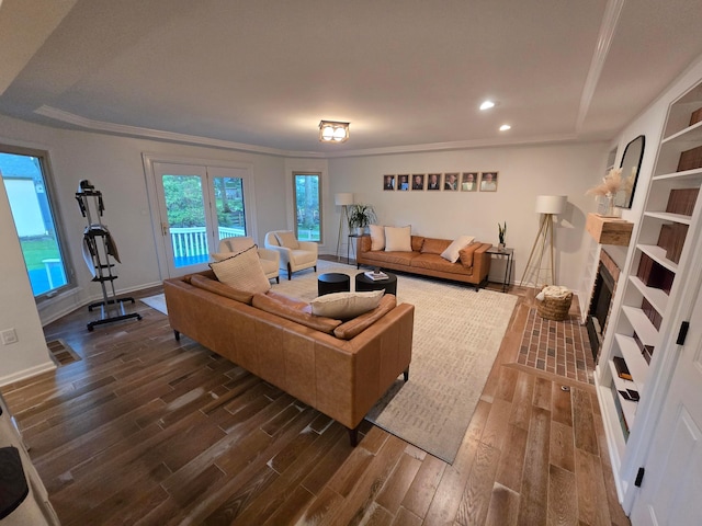 990 Venetian Way, Columbus, OH 43230 - living room with wood finished floors, a fireplace with flush hearth, recessed lighting, and crown molding