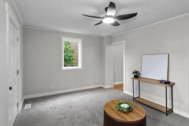 508 E Welch Ave, Columbus, OH 43207 - unfurnished room with carpet floors, ceiling fan, a textured ceiling, and ornamental molding