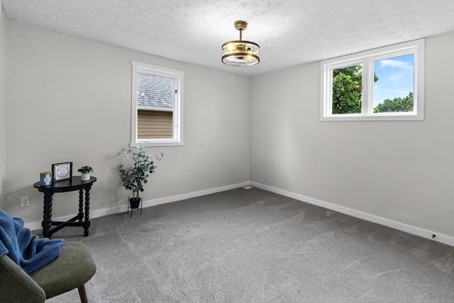 508 E Welch Ave, Columbus, OH 43207 - unfurnished room with a textured ceiling and carpet flooring