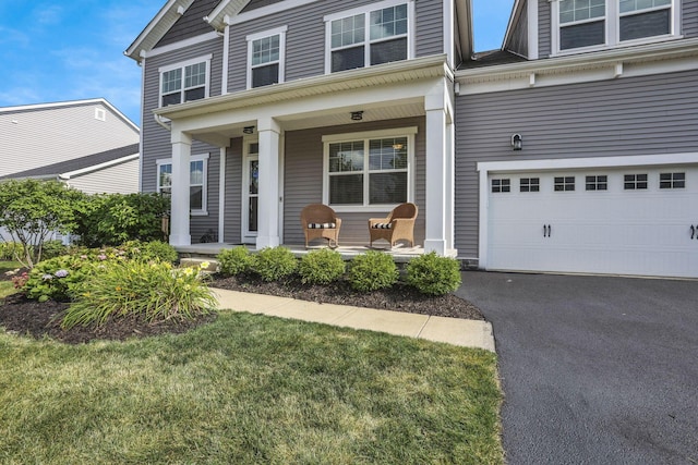 7263 Yarrow Run Rd, Plain City, OH 43064 - view of front of house with covered porch and asphalt driveway