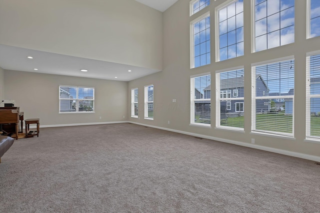 7263 Yarrow Run Rd, Plain City, OH 43064 - unfurnished living room featuring carpet and recessed lighting
