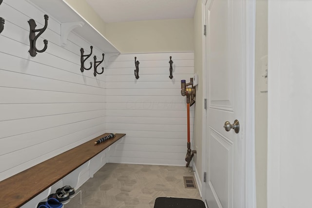 7263 Yarrow Run Rd, Plain City, OH 43064 - mudroom featuring wooden walls