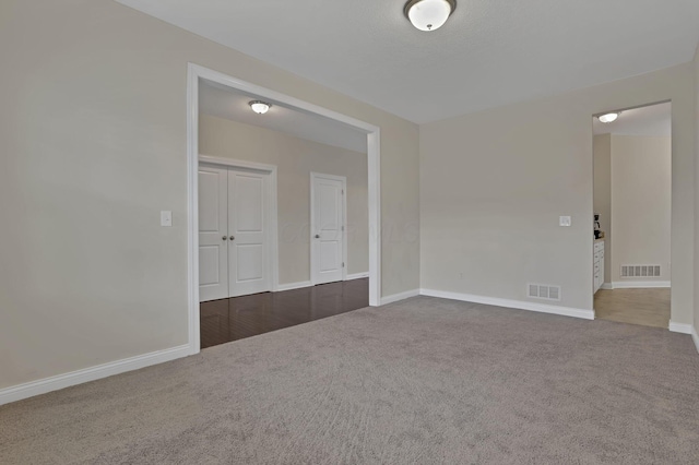 7263 Yarrow Run Rd, Plain City, OH 43064 - unfurnished room with dark carpet and baseboards
