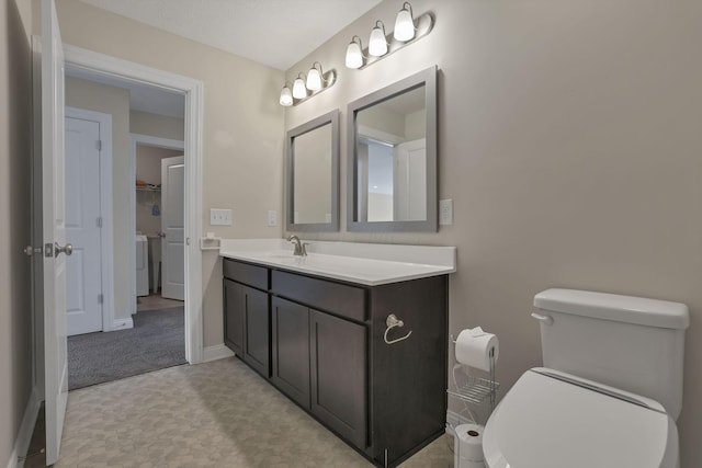 7263 Yarrow Run Rd, Plain City, OH 43064 - bathroom featuring vanity, washer / dryer, and tile patterned floors