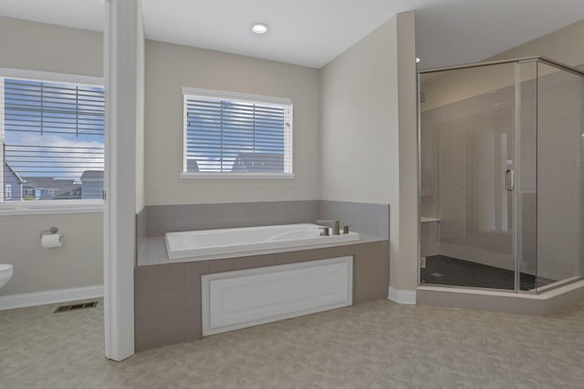 7263 Yarrow Run Rd, Plain City, OH 43064 - bathroom featuring a bath and a stall shower