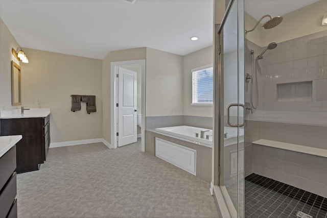 7263 Yarrow Run Rd, Plain City, OH 43064 - bathroom with vanity, a stall shower, and a garden tub