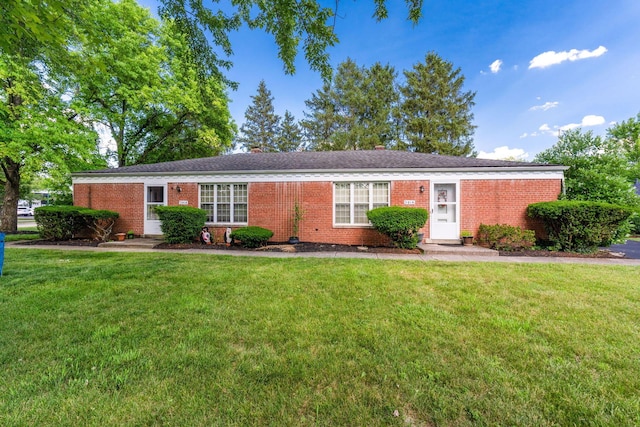 3016 Welsford Rd, Columbus, OH 43221 - ranch-style home with brick siding and a front yard