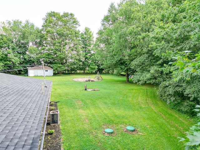 9020 Kinney Rd, Mount Vernon, OH 43050 - view of grassy yard featuring view of wooded area