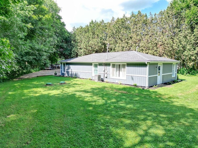 9020 Kinney Rd, Mount Vernon, OH 43050 - back of property with a lawn and a shingled roof
