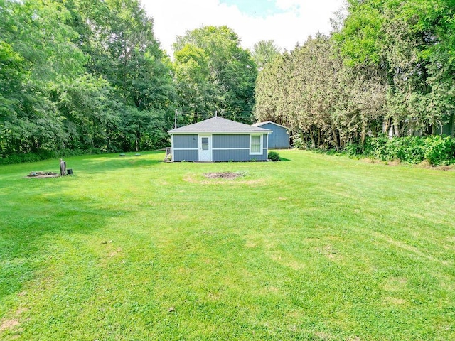 9020 Kinney Rd, Mount Vernon, OH 43050 - view of green lawn featuring an outbuilding