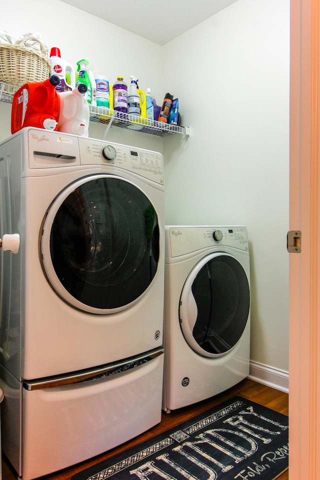 9065 Strawser St, Orient, OH 43146 - washroom featuring independent washer and dryer and wood finished floors