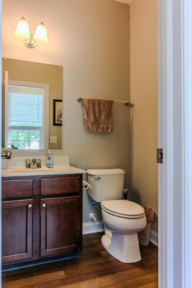 9065 Strawser St, Orient, OH 43146 - half bath featuring vanity and wood finished floors