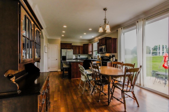 9065 Strawser St, Orient, OH 43146 - dining space with ornamental molding, dark wood-style floors, recessed lighting, and a chandelier